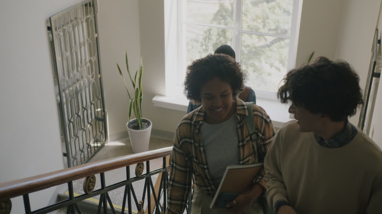 Students Walking Upstairs in a University Building