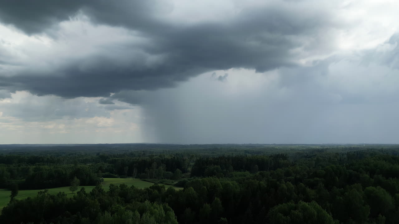 Heavy Rain over Forest - Dramatic Storm Clouds