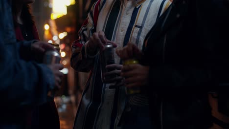 Friends Enjoying Drinks Outdoors at Night