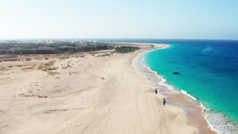 cinematic drone view of tropical desert beach