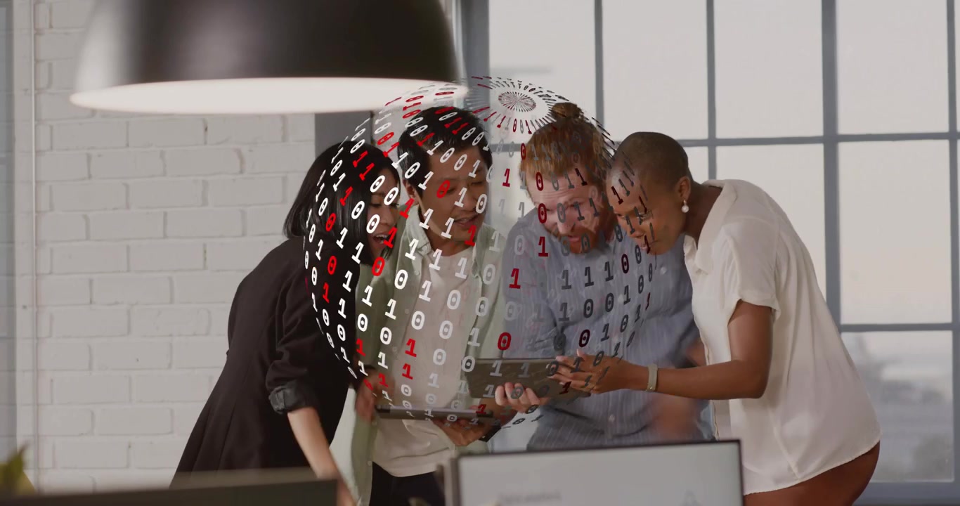 Team celebrating in tech office, high-fiving above hologram reviewing tablet data assessing results