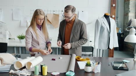 fashion designers collaborating in a design studio