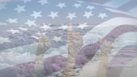 animación de la bandera de los ee.uu. soplando sobre las manos de las olas en el mar