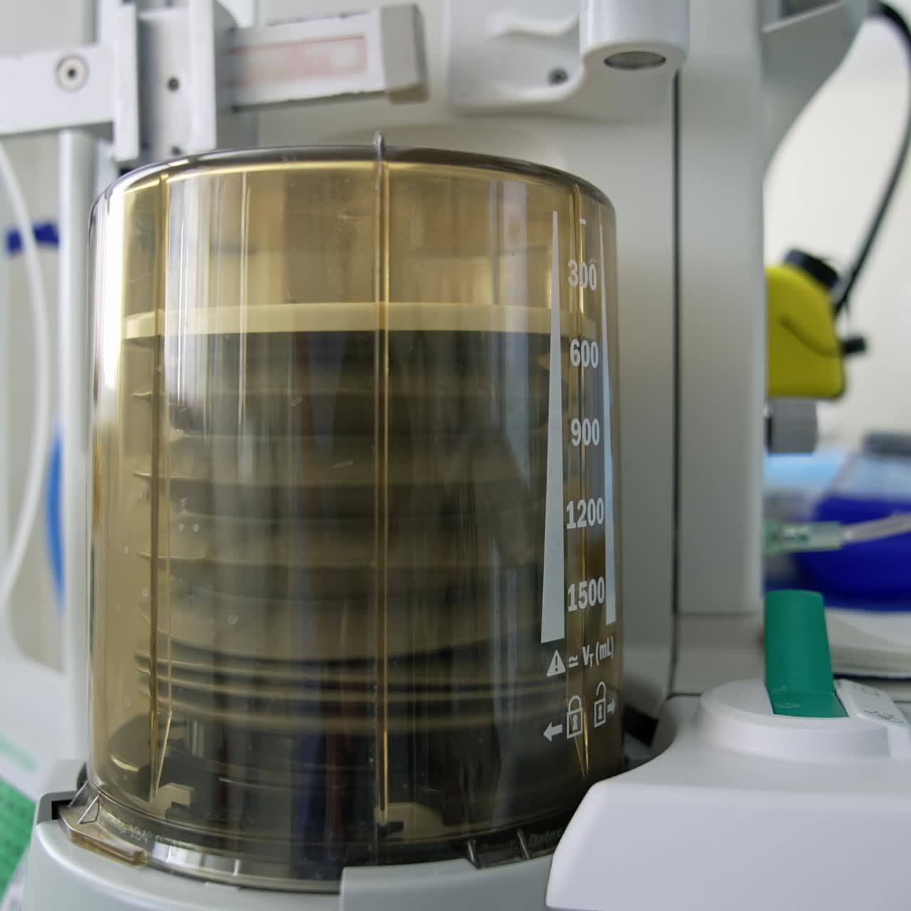 Anaesthesia machine ventilator. Medical equipment for saving patient's life in the operating room on the blur background of doctors. Close-up