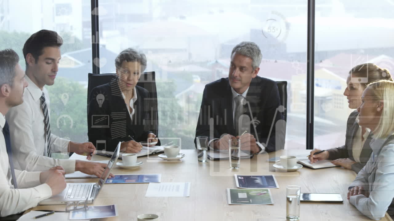 Animation of statistical data processing over diverse businesspeople discussing together at office