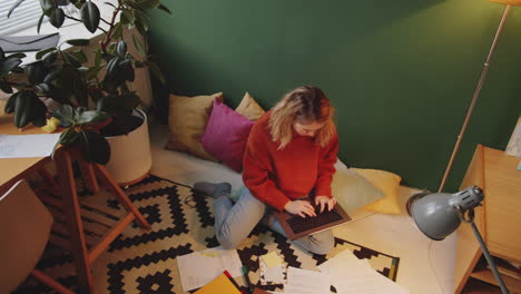 woman working on laptop at home