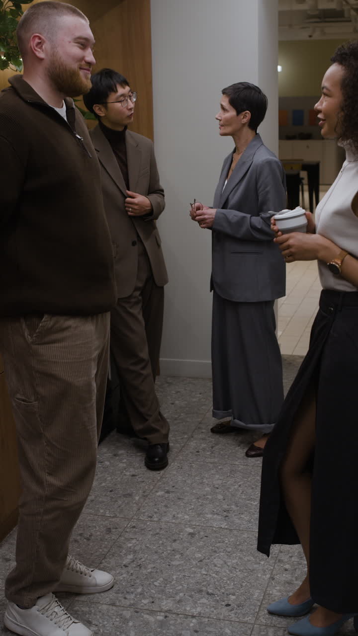 Group of people in suits in office