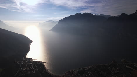 aerial view of majestic mountains surrounding garda lake in italy