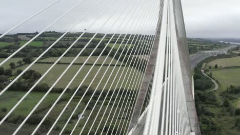 dramatic aerial view of cable stayed bridge towers, cables and decking