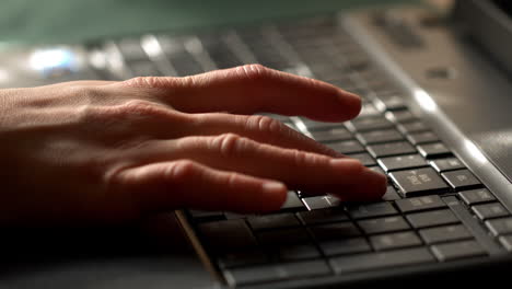 Hands typing on a keyboard
