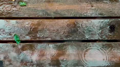 rain on deck wood close up slow motion still shot