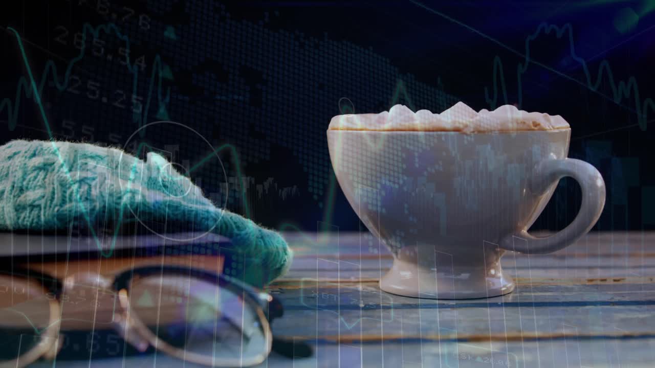커피 컵, 책, 테이블 위에 놓인 컵 위에 금융 그래프의 애니메이션