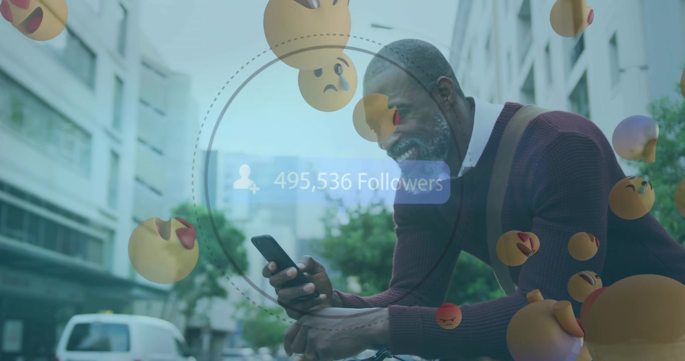 Animation of face emojis and increasing followers icon against african american man using smartphone