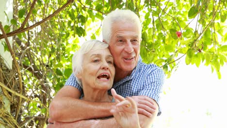 Senior-couple-hugging-his-wife