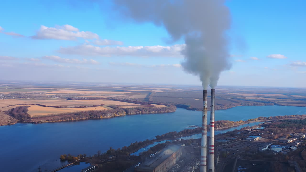 Toxic production company enterprise. Smoking from factory tube.