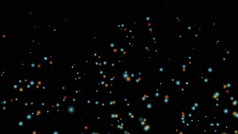 partículas de colores flotando en el espacio