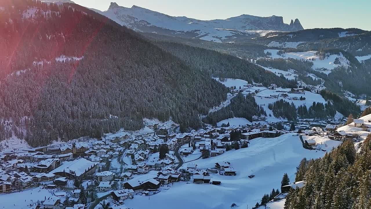 Winter view of snow-covered village in the Italian Alps