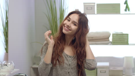 Brunette-woman-with-long-hair-smile-in-morning-bath-room.-Good-morning