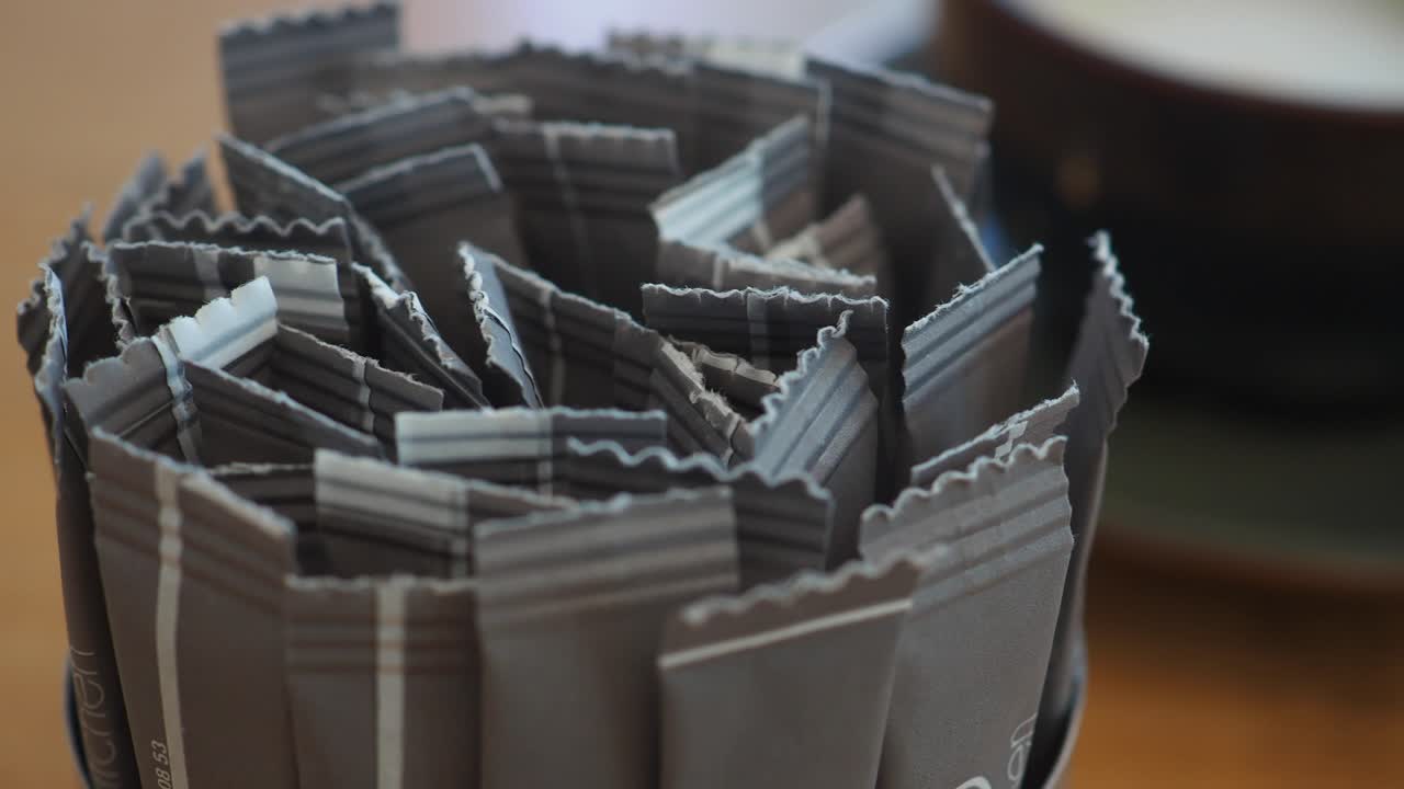 Close up of sugar packets