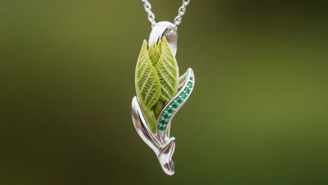Elegant Silver Pendant Featuring Realistic Green Leaf Design, Showcasing Intricate Detailing and Sustainable Aesthetic Appeal in a Nature-Inspired Accessory