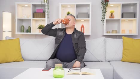 the sick old man drinks a lot of water.