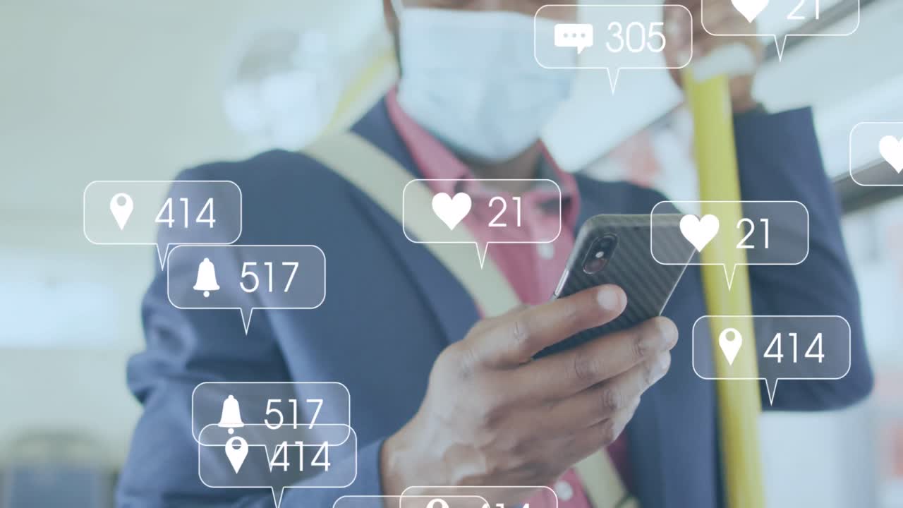 스마트폰을 사용하여 얼굴 마스크를 착용한 두 인종 남성에 대한 소셜 미디어 아이콘의 애니메이션