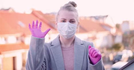 woman wearing protective mask and gloves