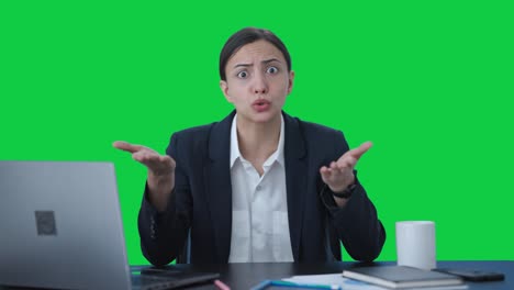 angry indian female manager shouting on someone green screen