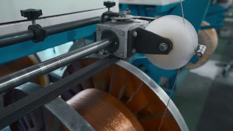 close-up view of a cable manufacturing machine