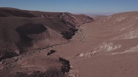 flight over the atacama desert with arid landscape in northern chile, south america