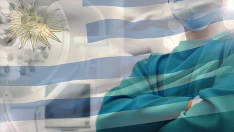 animation of flag of uruguay waving over surgeon in operating theatre