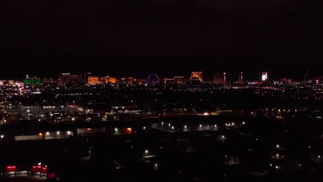 Aerial-super-wide-rising-dolly-shot-of-the-Las-Vegas-Strip-at-night