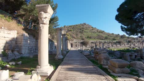 point of view of the walkway at agora commercial marketplace enclosed by colonnades in ephesus