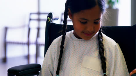 girl sitting on a wheelchair