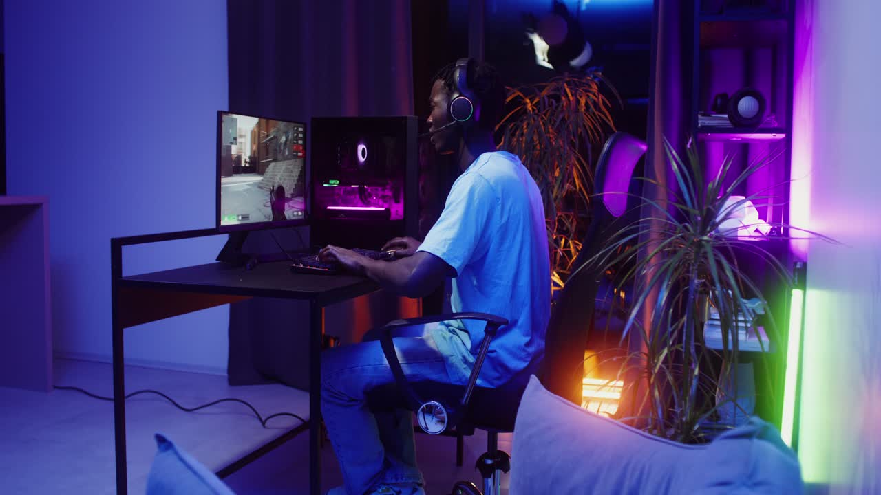 Man playing video game on computer