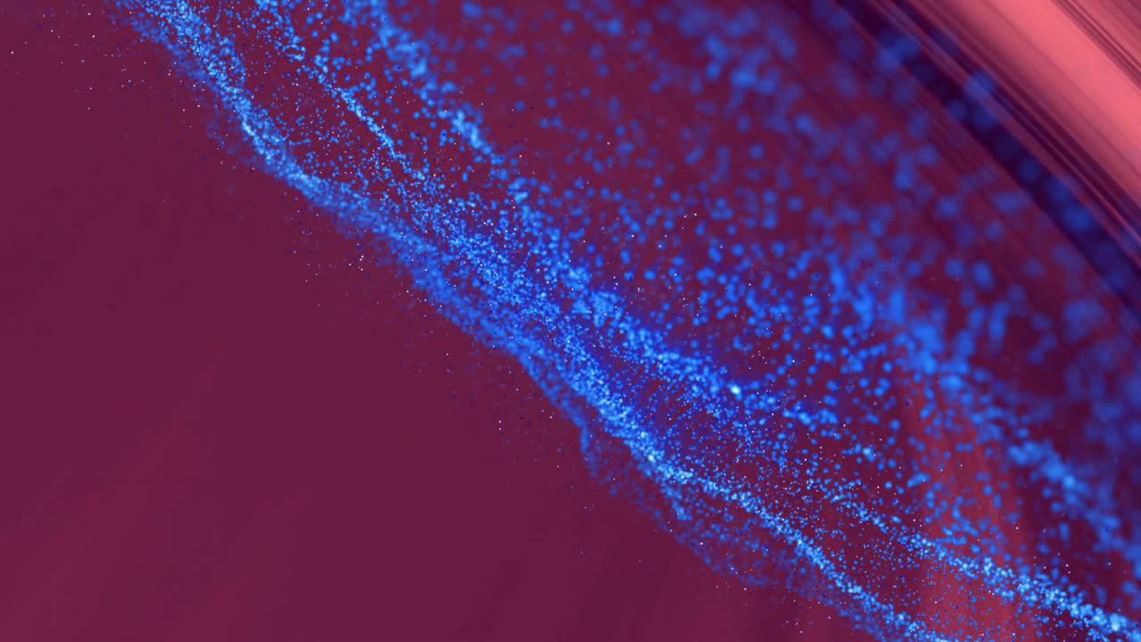 파란색 입자가 빨간색 배경 위에 파동 패턴을 형성합니다. 추상적인 애니메이션입니다.