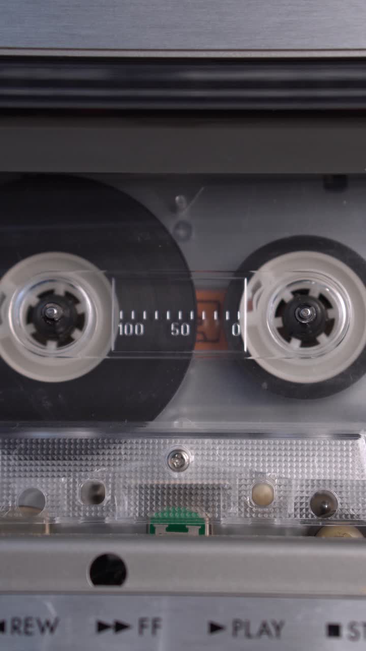 Close-up of a Vintage Cassette Tape in a Tape Deck