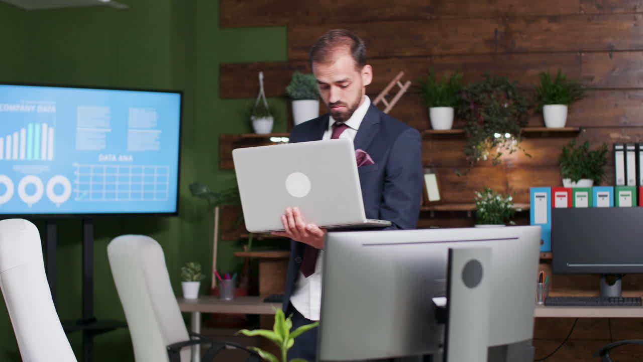 Man working with laptop in office