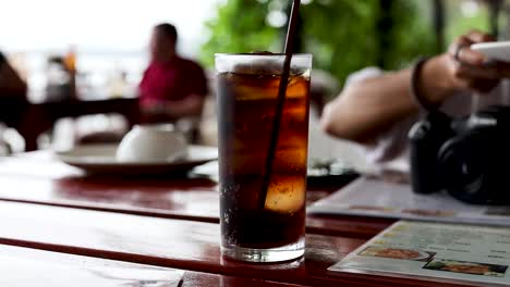 sharing drinks and food at a restaurant