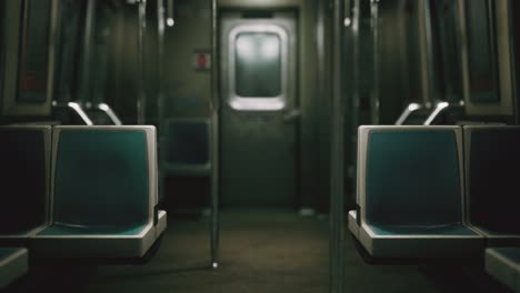 inside of the old non-modernized subway car in usa