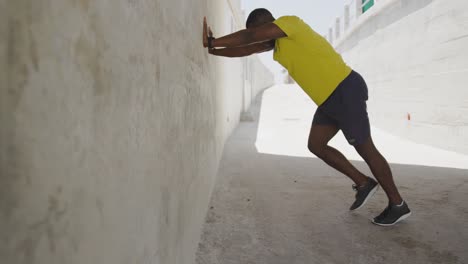 man exercising in an urban setting