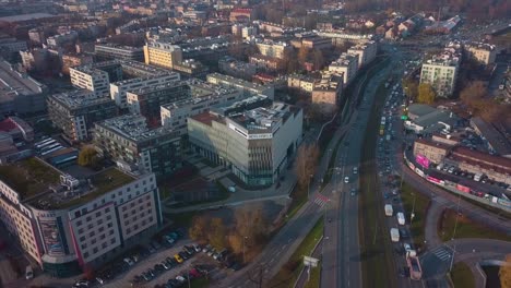 aerial view of a traffic street, in the middle of krakow, poland, at dusk