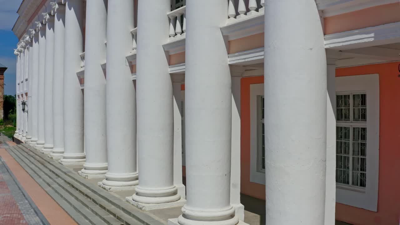 People on column building. Aerial drone view of column building