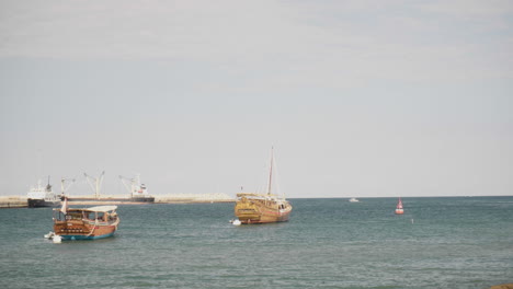 dhow ship in mutrah bay, muscat, oman