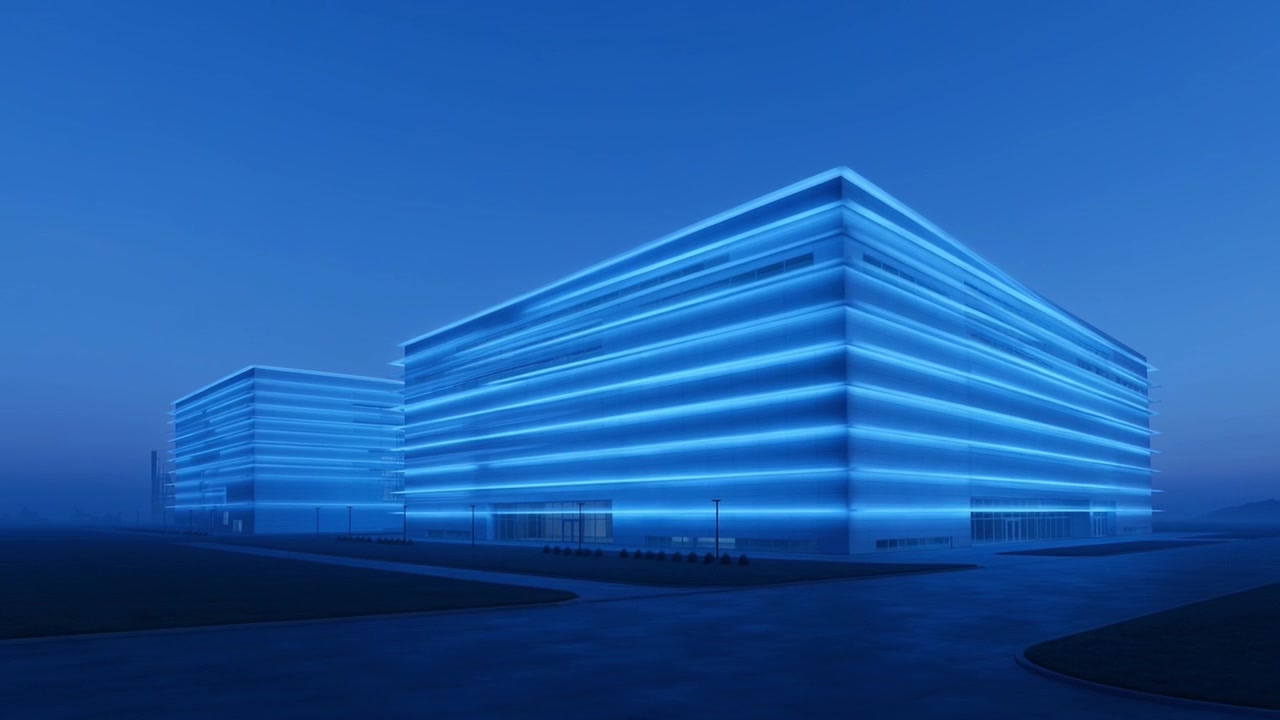 Edifici per uffici moderni illuminati da luci al neon blu di notte