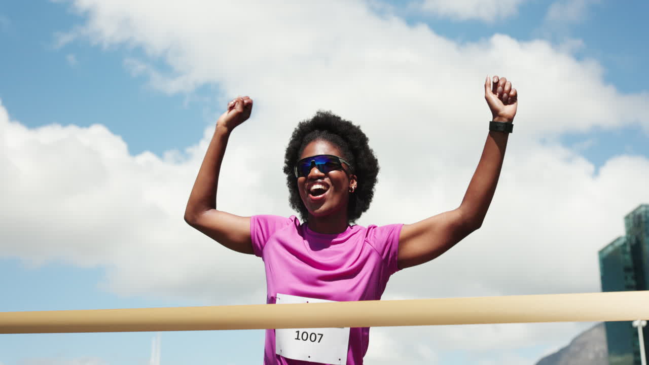 Joyful Woman Runner Celebrates Crossing Finish Line