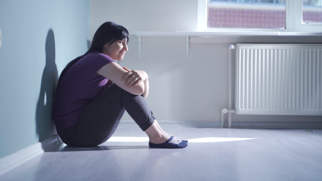 Fearful woman. She is in a bad mood at home.