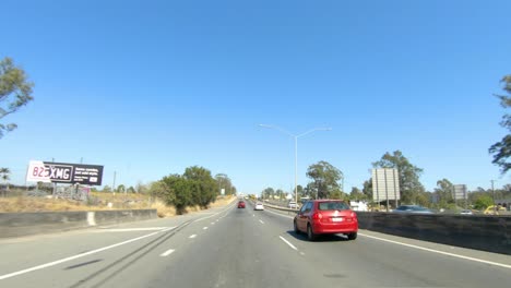 front facing driving point of view pov of australian suburban freeways and city streets - ideal for interior car scene green screen replacement