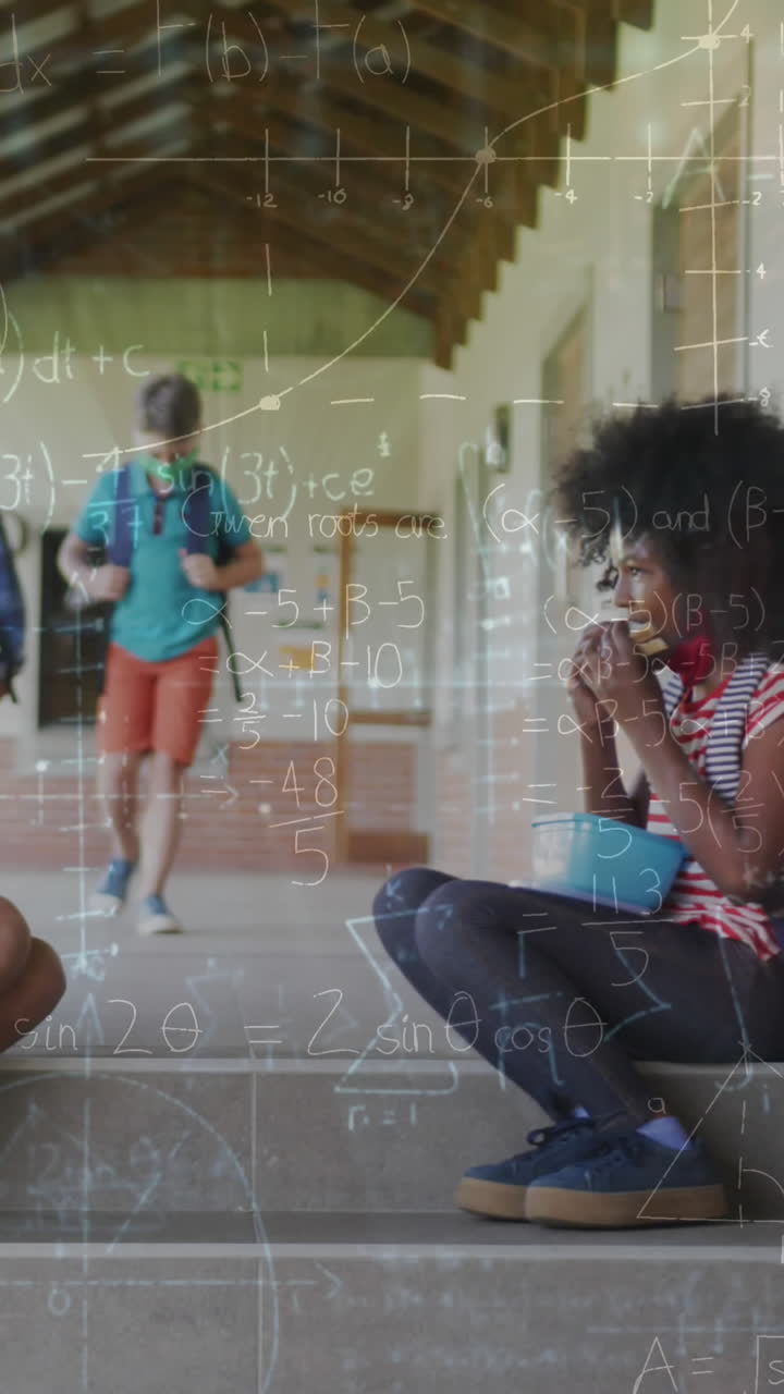 Animation of mathematical equations over diverse schoolchildren wearing face masks