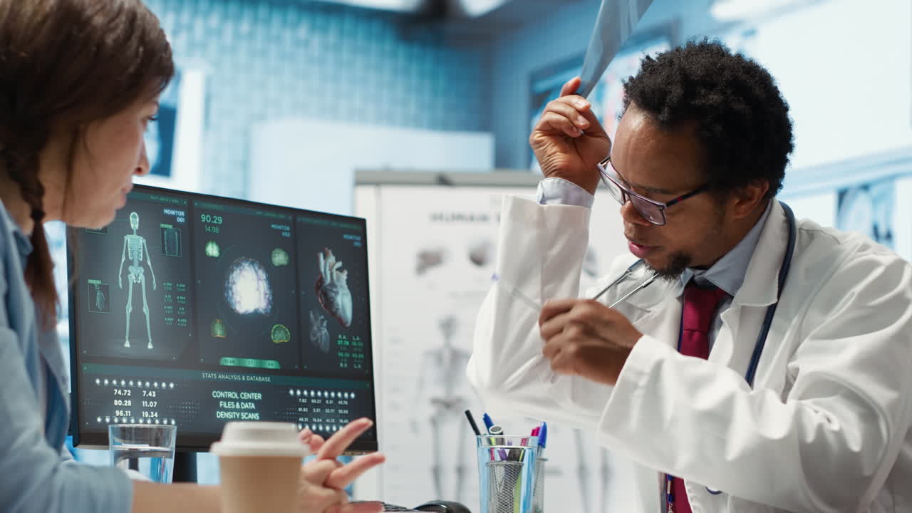 Medical expert specialist explaining the x ray imaging for a diagnosis